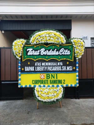 Papan Bunga Duka di Topos