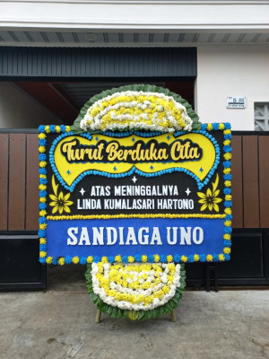 Papan Bunga Duka di Topos