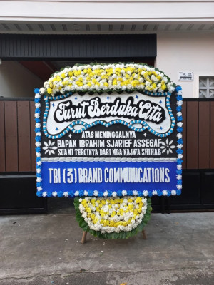 Papan Bunga Duka di Topos